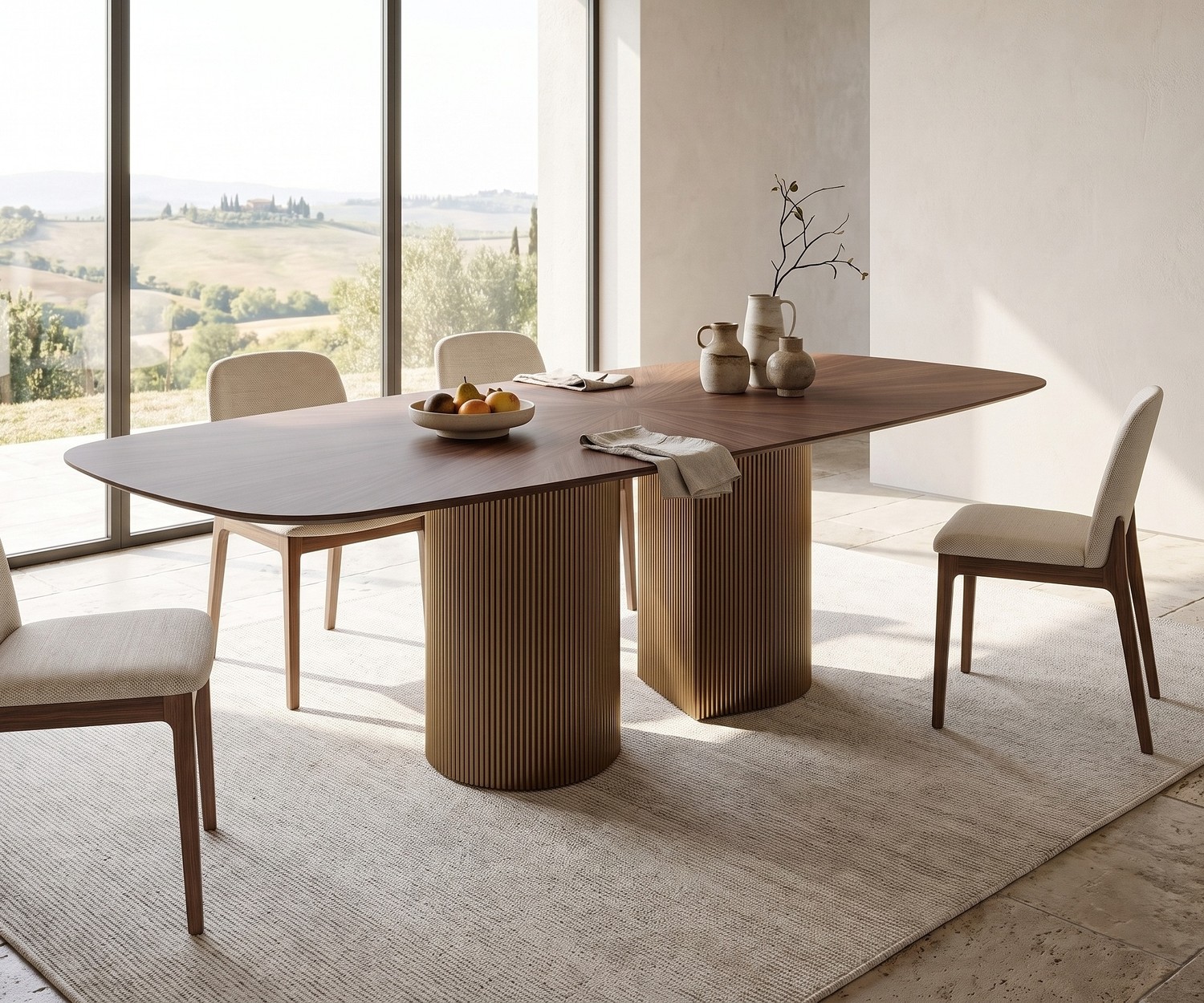 Table à manger ovale al2 dakry b 001 en bois avec double piétement en métal doré dans une salle à manger épurée.