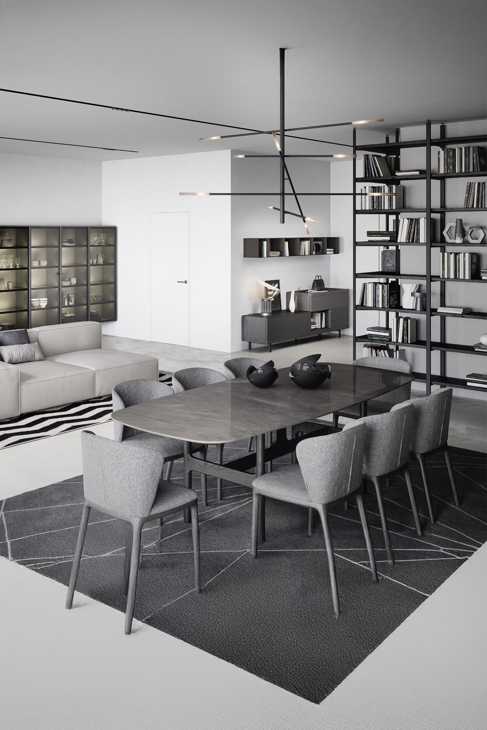 salon moderne en gris, noir et blanc avec table à manger de forme organique