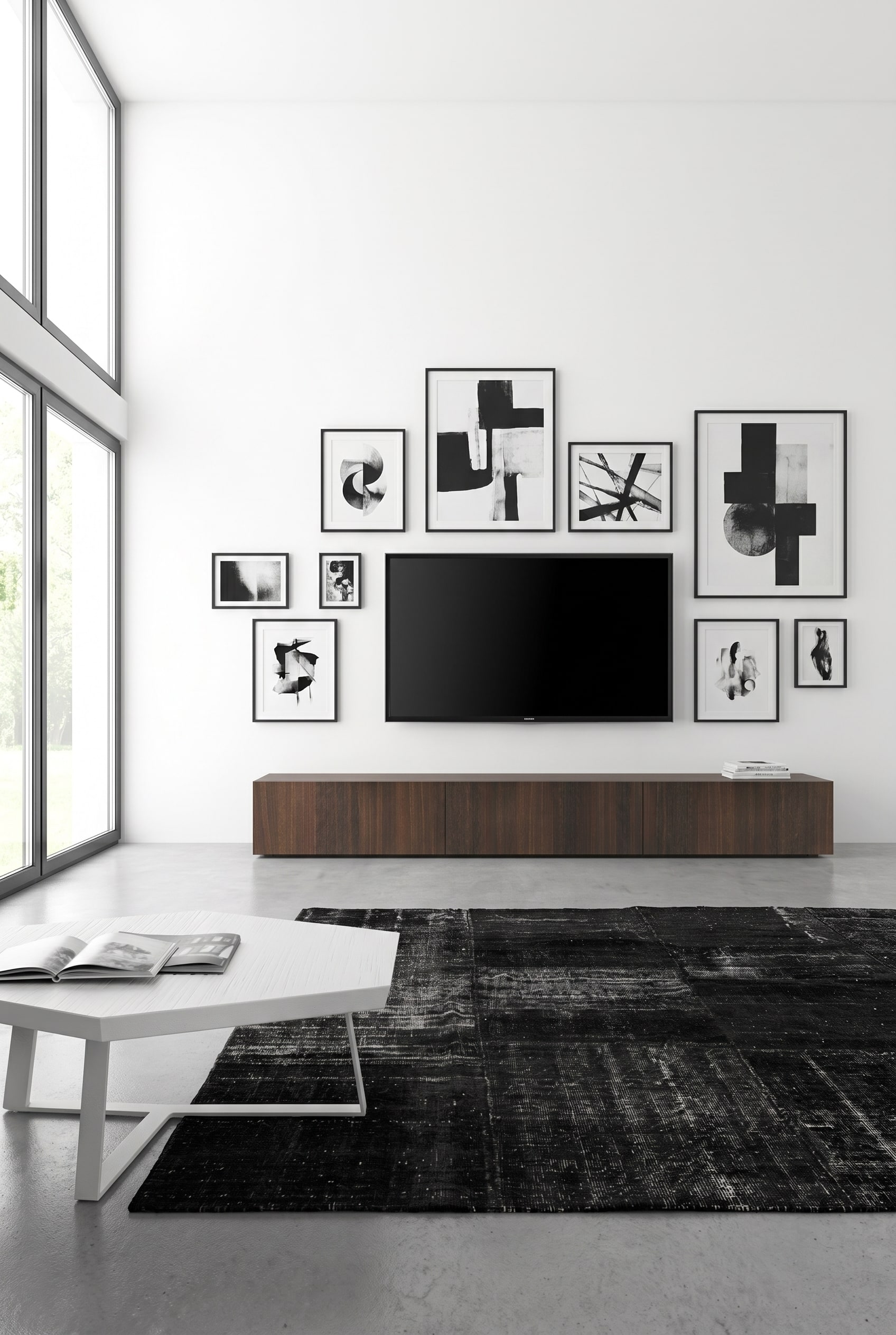 Braunes Eichenholz-Lowboard mit flacher Silhouette unter einem ausgeschalteten Fernseher vor heller Wand im minimalistischen Wohnzimmer