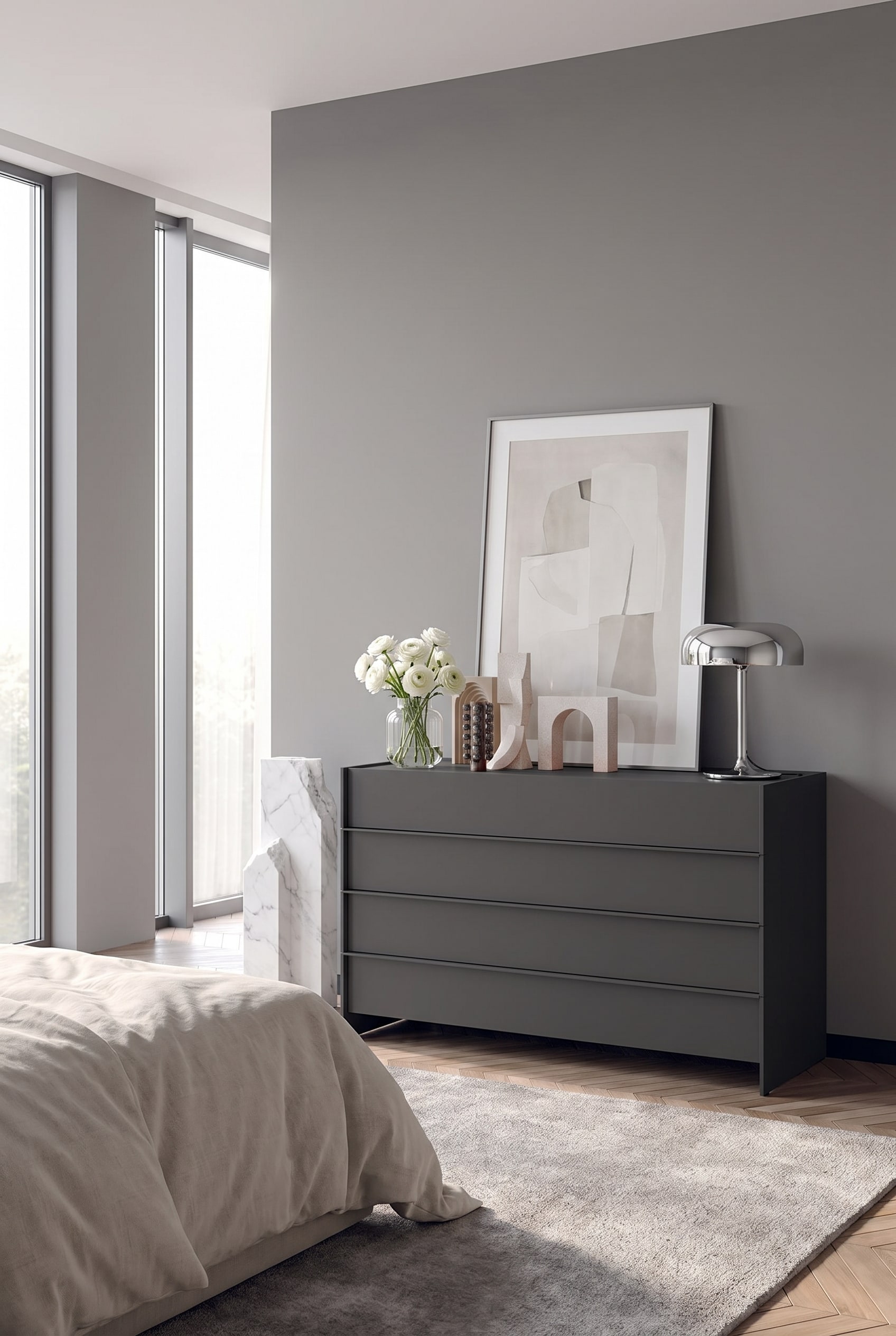 Grifflose, minimalistische Kommode in hellem Grau, Ton-in-Ton mit der Wand im Schlafzimmer verschmelzend