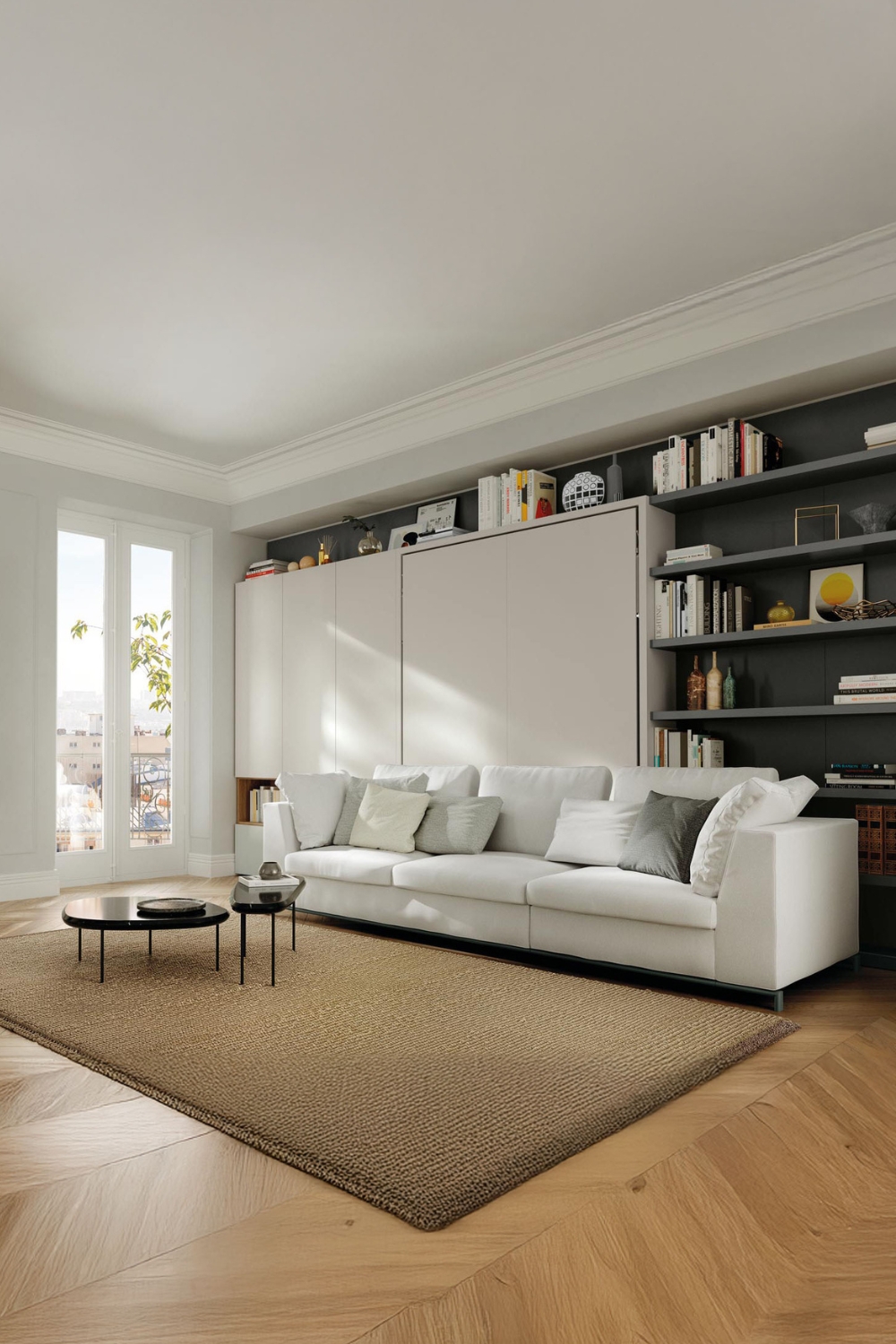 lit escamotable blanc puriste avec grand canapé et deux tables sombres