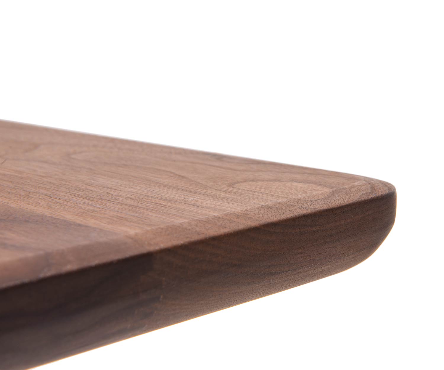 Conde House Table de designer Ten en détail dans le profil des chants du plateau de table en noyer Conde House Table de designer Ten en détail dans le profil des chants du plateau de table en noyer