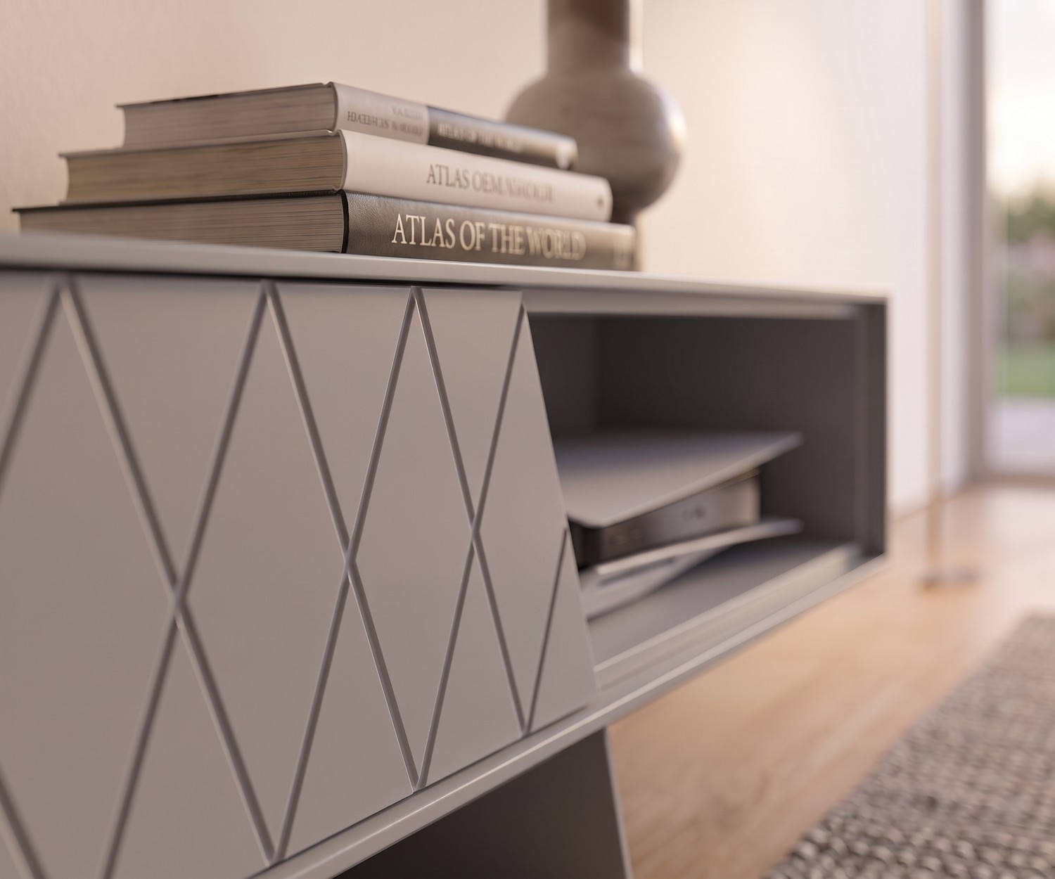 Meuble TV bas e-klipse 008 par al2 dans un salon. Buffet bas moderne gris à motif losange avec livres et console de jeux.