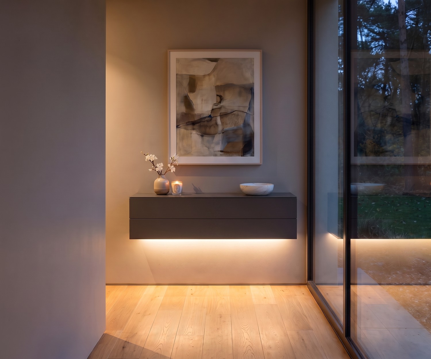 Commode suspendue Novamobili Easy à 2 tiroirs Commode suspendue Easy de Novamobili dans un couloir, meuble d'entrée moderne sans poignée gris avec éclairage LED.