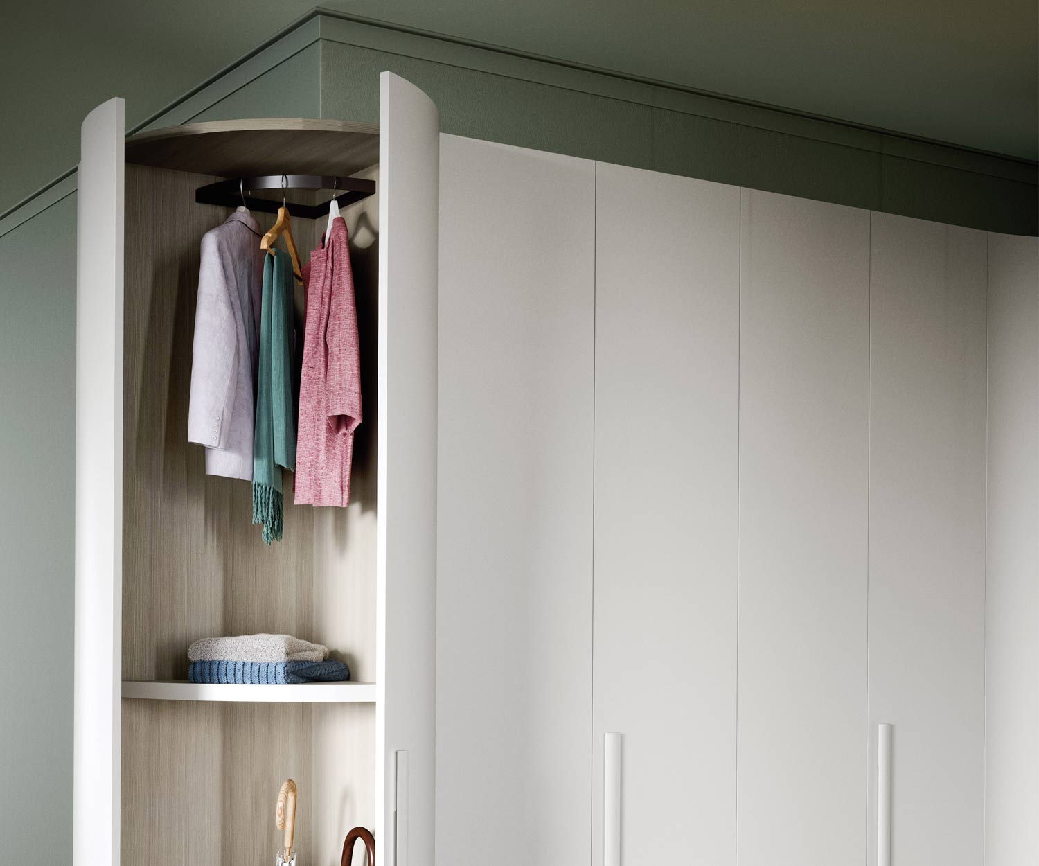 Armoire ronde Alfa Curvo avec penderie et porte battante ouverte Armoire ronde Alfa Curvo avec penderie et porte battante ouverte